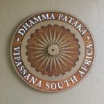 Round sign board Dhamma Pataka Vipassana Meditation Center Worcester in South Africa